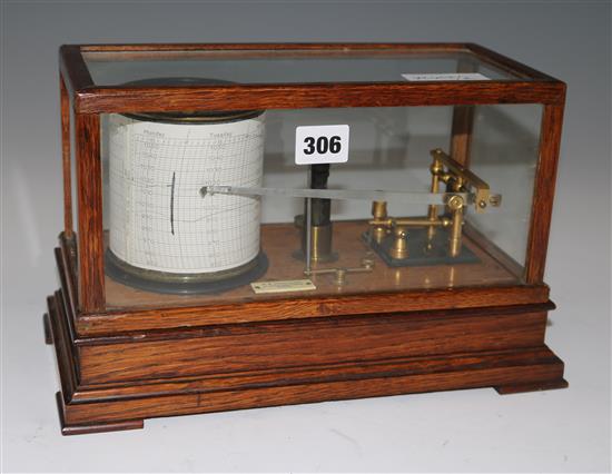 An oak cased barograph